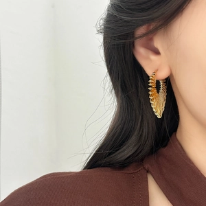Elegant gold layered spiral feather earrings for women in a luxury vintage design