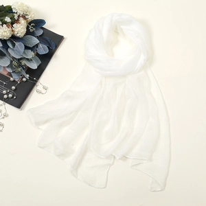 Close-up of pure white 30D chiffon scarf with soft texture and elegant pearl accents