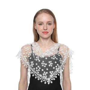 White lace embroidered triangular shawl with floral patterns and delicate fringe tassels