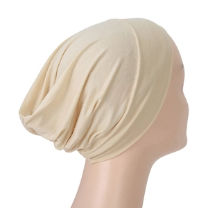 Detail of beige modal jersey hijab undercap showing soft fabric texture and elastic stitching