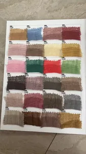 Detailed color chart showing 24 shades of lightweight crepe linen fabric samples 49 to 72