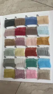 Fabric color chart displaying 24 shades of cotton linen fabric samples with frayed edges