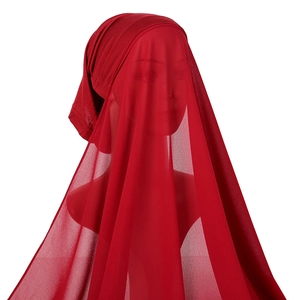 Detail of dark red chiffon hijab set with inner cap showing fabric drape and texture