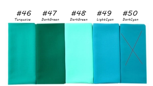Detail view of pearl chiffon bubble scarves in various turquoise and green shades