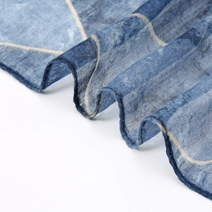 Blue geometric scarf made of breathable Bali yarn with lightweight semi-transparent fabric