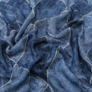 Detail view of woven blue and white plaid scarf fabric with natural drape and texture