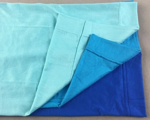Close-up of modal cotton hijab caps showing knit texture and stitching in multiple colors