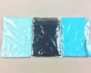 Three modal underscarf hats in mint, black, and blue colors, each in separate clear packaging