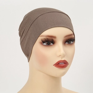 Brown modal underscarf hijab cap with elastic fabric shown on a mannequin head