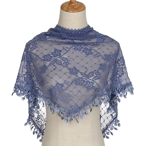 Detailed blue floral lace shawl with delicate mesh patterns and elegant fringe trim