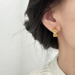 Elegant gold hollow heart earrings for women with a vintage layered cutout design