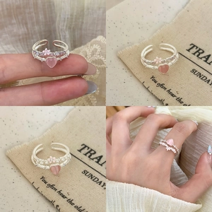 Minimalist silver open rings set with pink heart stone and floral accents for women