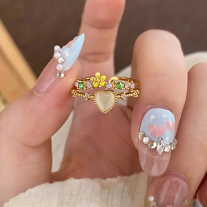 Minimalist double-layered open ring with heart-shaped opal and yellow flower charm