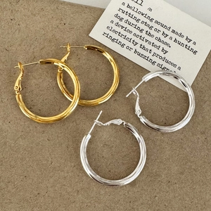 Créoles Géométriques Torsadées Cuivre Plaqué Or Et Argent Spirale Bijoux De Mode Minimalistes Femmes