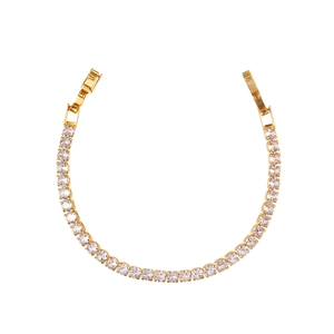 Elegant gold plated tennis bracelet featuring sparkling zircon stones on a white background