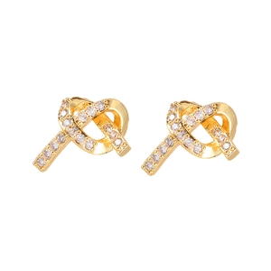 Boucles d'oreilles nœud dorées élégantes ornées de zircons scintillants micro-pavés