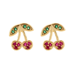 Macro shot of sweet cherry stud earrings with red crystals and golden leaves