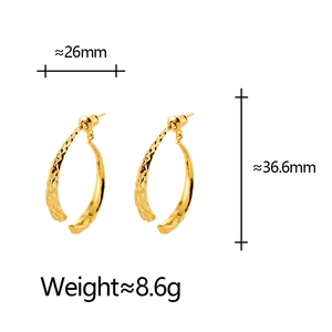 Textured gold-finish curved earrings with elegant diamond-cut surface pattern