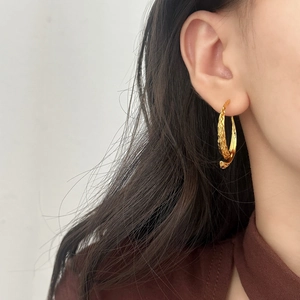 French style textured gold hoop earrings for women with a luxury hammer-finished surface