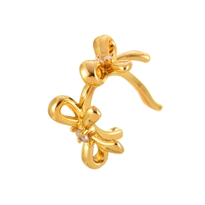 Elegant gold double bow ear cuff with sparkling zircon accents on white background