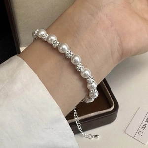 Elegant pearl bracelet with sparkling disco ball beads and silver adjustable chain for women
