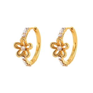 Elegant gold hoop earrings with textured flower design and sparkling zircon inlays