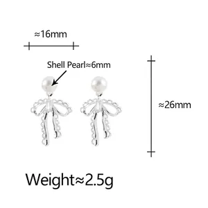 Elegant bow stud earrings with 6mm shell pearl and dimension details on white background