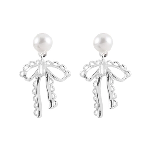 Elegant bow knot earrings with white pearls and delicate silver lace texture design