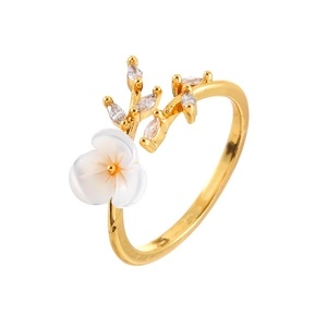 Elegant gold leaf ring with white shell flower and sparkling marquise zircon accents
