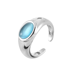 Adjustable silver ring with oval blue cat eye stone in a modern minimalist design