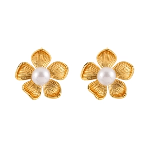 Elegant gold flower stud earrings with white pearl centers and vintage textured petals