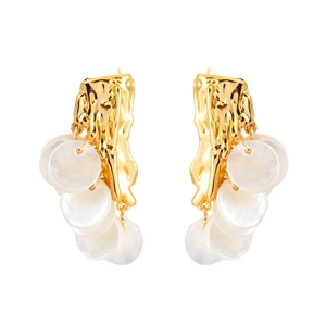 Elegant gold earrings with layered mother of pearl shell charms in a cascading fringe design