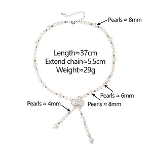 Collier de perles de style français avec pendentif fleur et perles de tailles variées