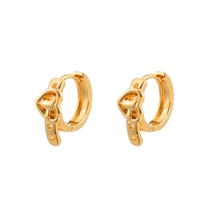 Symmetric pair of vintage golden heart hoop earrings with hollow design on white background