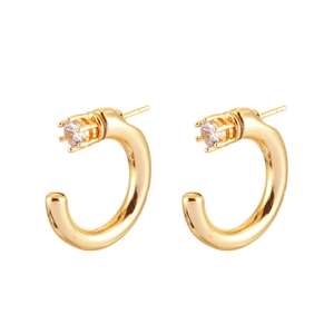 Golden C-shaped stud earrings featuring a single round claw-set cubic zirconia stone