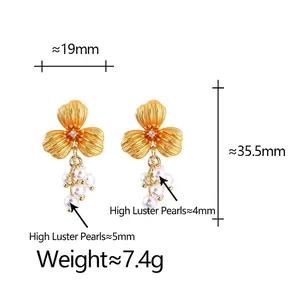 Matte flower earrings with high-quality pearls and gold tassels measuring 35.5mm long