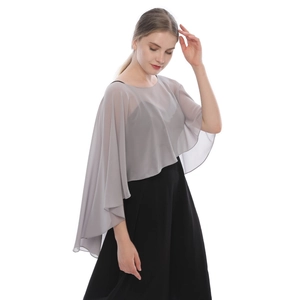 Detail of elegant grey chiffon shawl with a sheer texture and irregular capelet drape