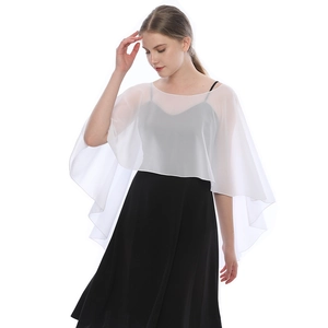 Detail of white chiffon shawl featuring sheer fabric and elegant ruffled hemline design