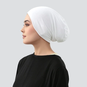 Side view of white mercerized cotton hijab undercap showing soft texture and hair space