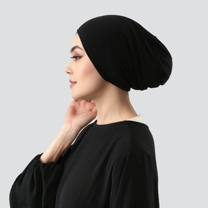 Side view of a black mercerized cotton inner hijab cap with premium breathable fabric