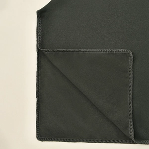 Close-up of dark grey slip-on turban showing high-quality stitching and woven texture