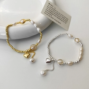 Elegant freshwater pearl heart bracelet in gold and silver finish for women