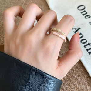 Elegant bamboo-shaped open ring in gold with pink enamel and sparkling crystals