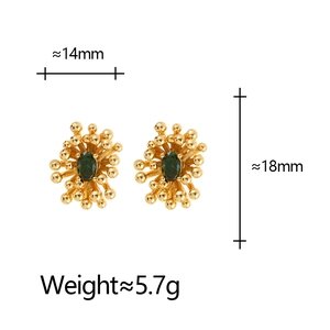 Golden flower stud earrings with green zircon centers and polished sunburst petals