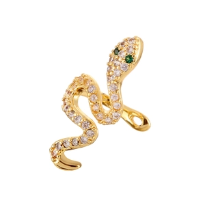 Minimalist snake-shaped ear cuff in gold finish with sparkling pavé zircons and green gem eyes