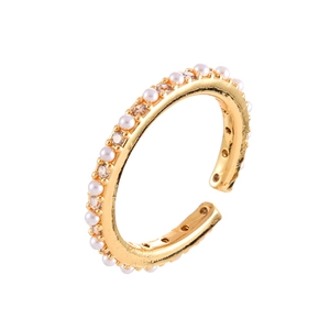 Elegant gold open ring with faux pearls and sparkling cubic zirconia on white background