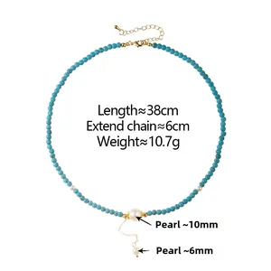 Detail of 10mm blue turquoise beads and 6mm white pearls on a gold-plated clasp necklace