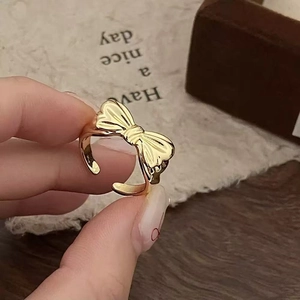 Elegant gold butterfly adjustable ring with textured finish for women's daily fashion style