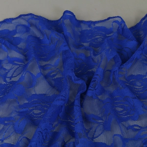 Close-up of blue lace triangle scarf featuring intricate floral rose hollow embroidery