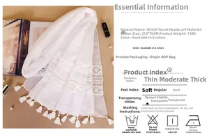 Detailed view of white cotton lace scarf with elegant fringes and dimensions chart